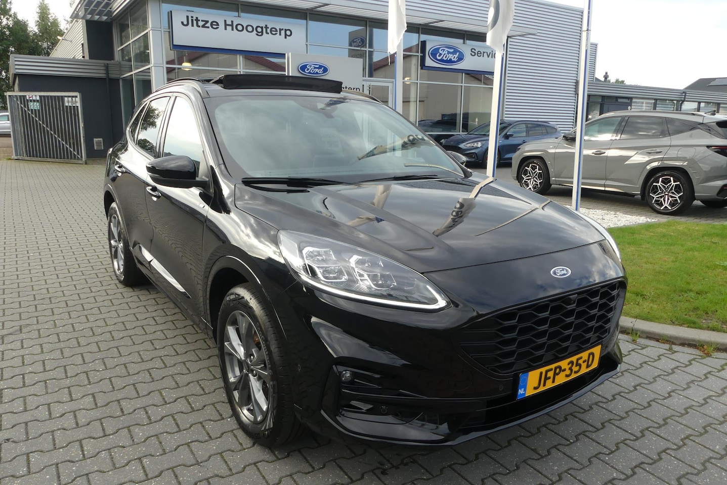 Ford Kuga - 2.5 PHEV ST-Line X PANO, ADAPT. CRUISE, ADAPT. KOPLAMPEN, B&O, CLIMA, HUD, WINTER PACK, NA - AutoWereld.nl