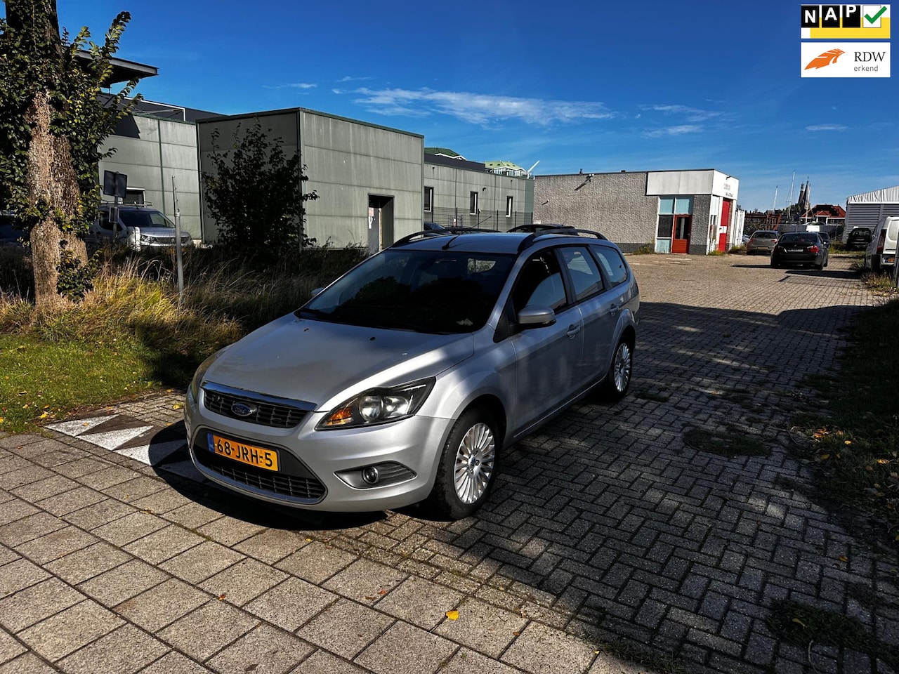 Ford Focus Wagon - 1.8 Titanium Flexi Fuel Clima.Navi - AutoWereld.nl