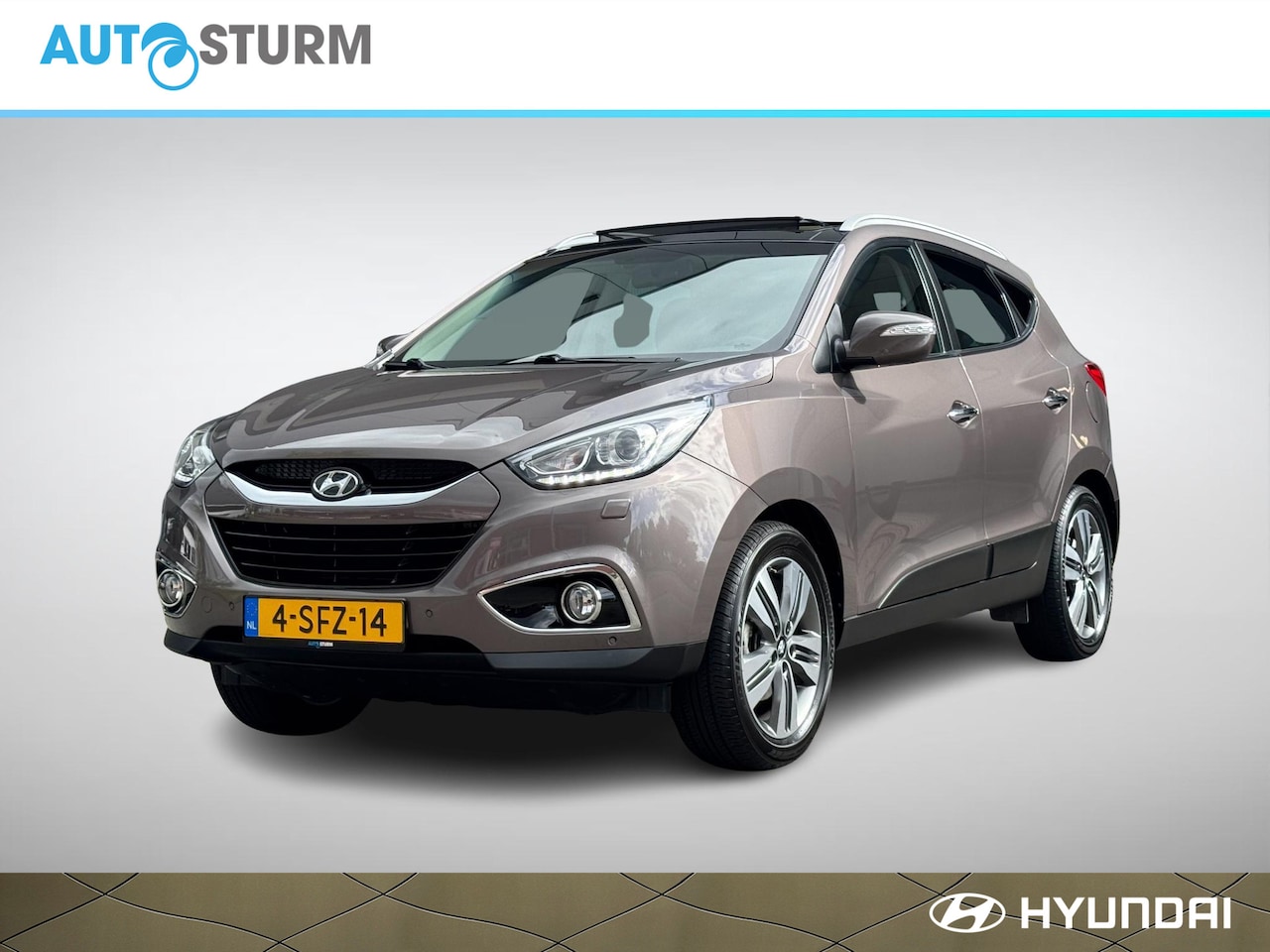 Hyundai ix35 - 2.0i i-Catcher Automaat | Panoramadak | Navigatie | Camera | Stoelverwarming | Cruise & Cl - AutoWereld.nl