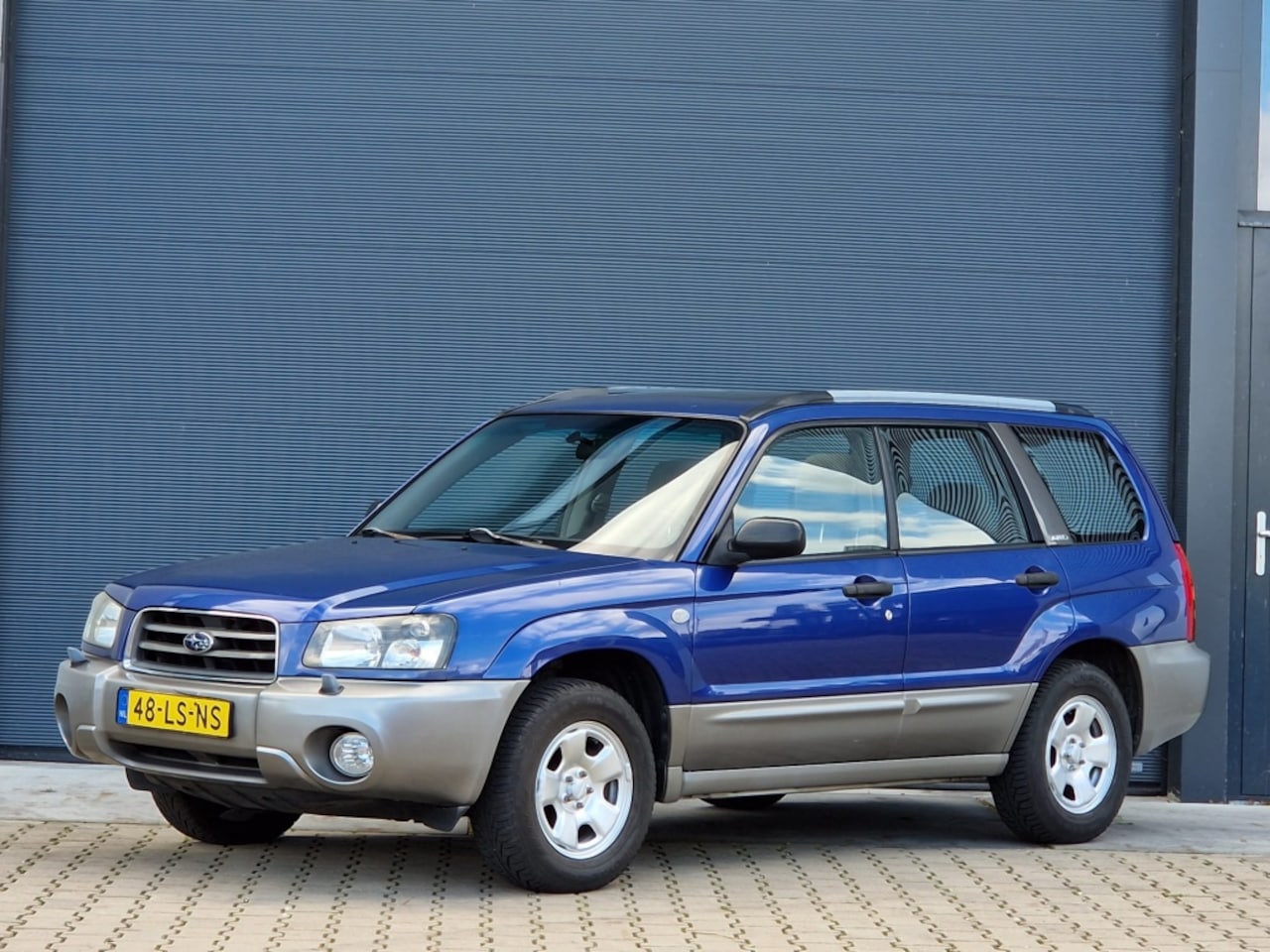 Subaru Forester - 2.0 AWD X nap airco/schuifdak apk 09'2026 - AutoWereld.nl