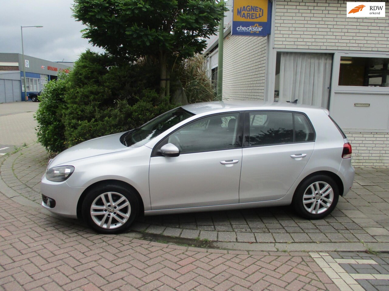 Volkswagen Golf - 1.2 TSI Highline BlueMotion 1.2 TSI Highline BlueMotion - AutoWereld.nl