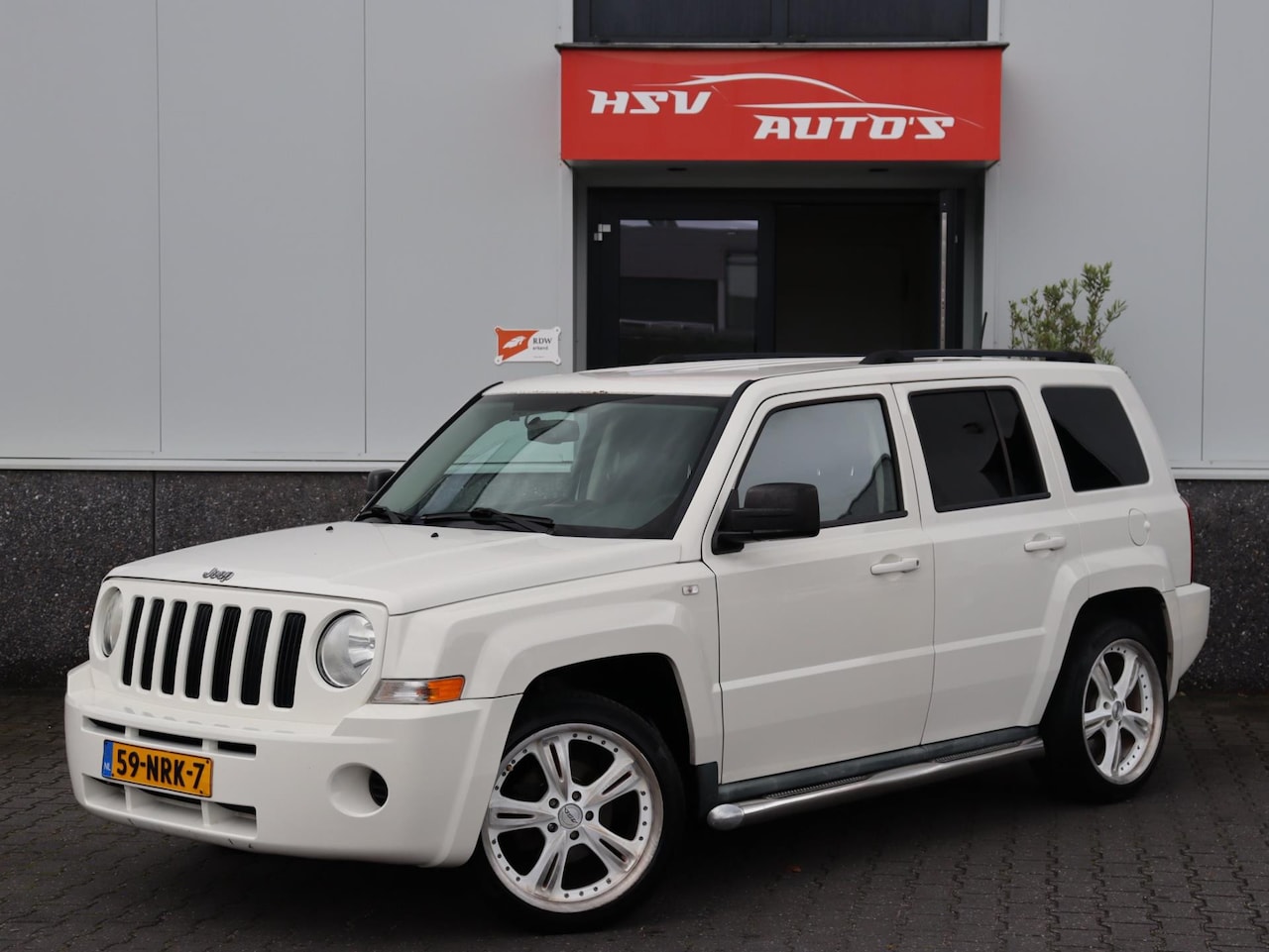 Jeep Patriot - 2.4 Sport Liberty airco org NL - AutoWereld.nl
