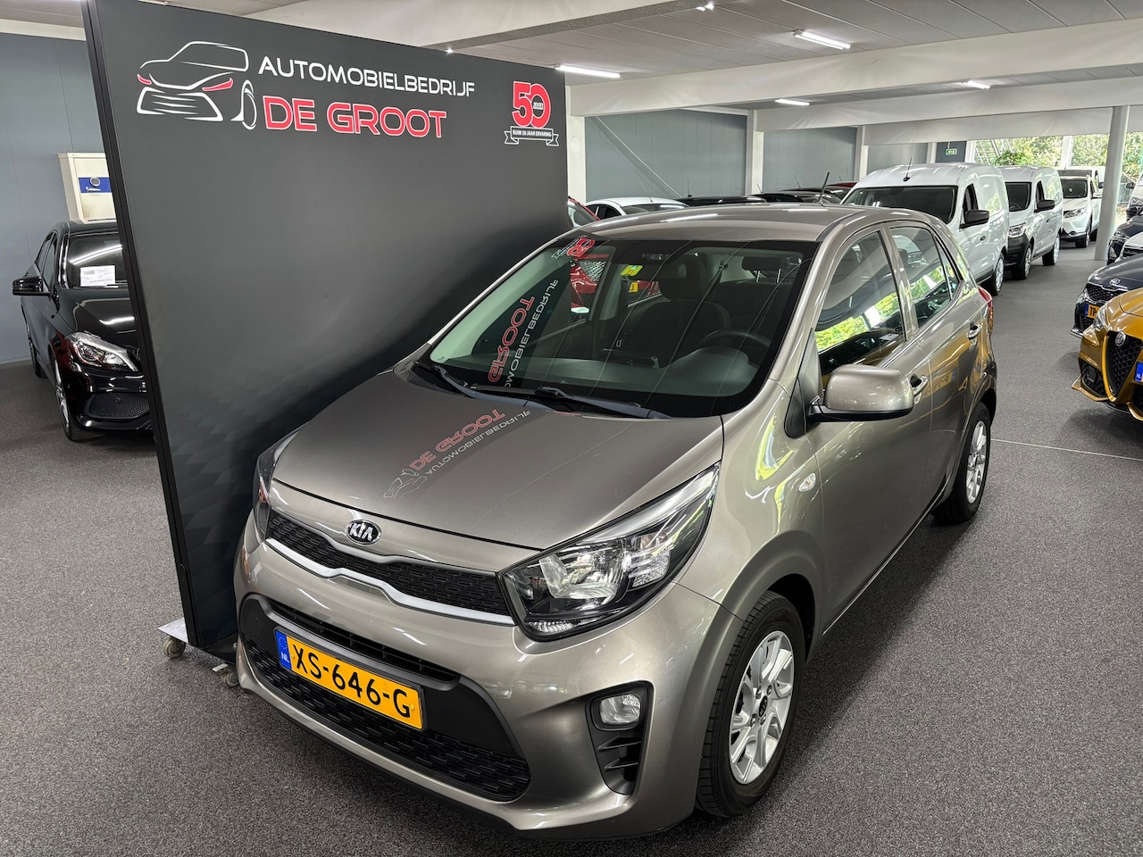 Kia Picanto - 1.0 CVVT EconomyPlusLine NL-auto, Airco en LM-velgen - AutoWereld.nl