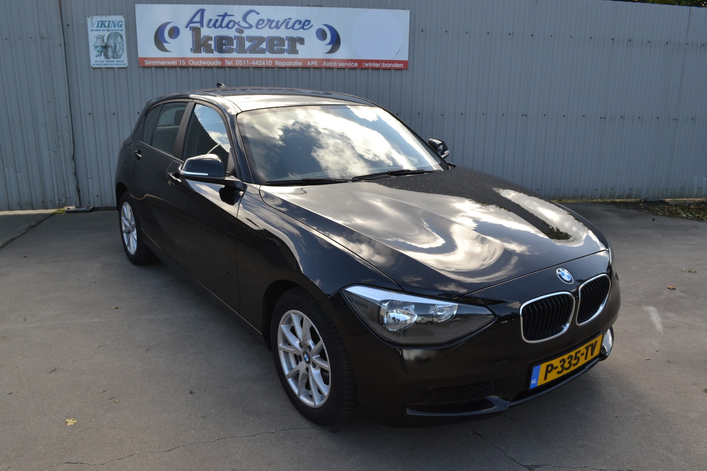 BMW 1-serie - 116i Airco Cruise Pdc Nav - AutoWereld.nl