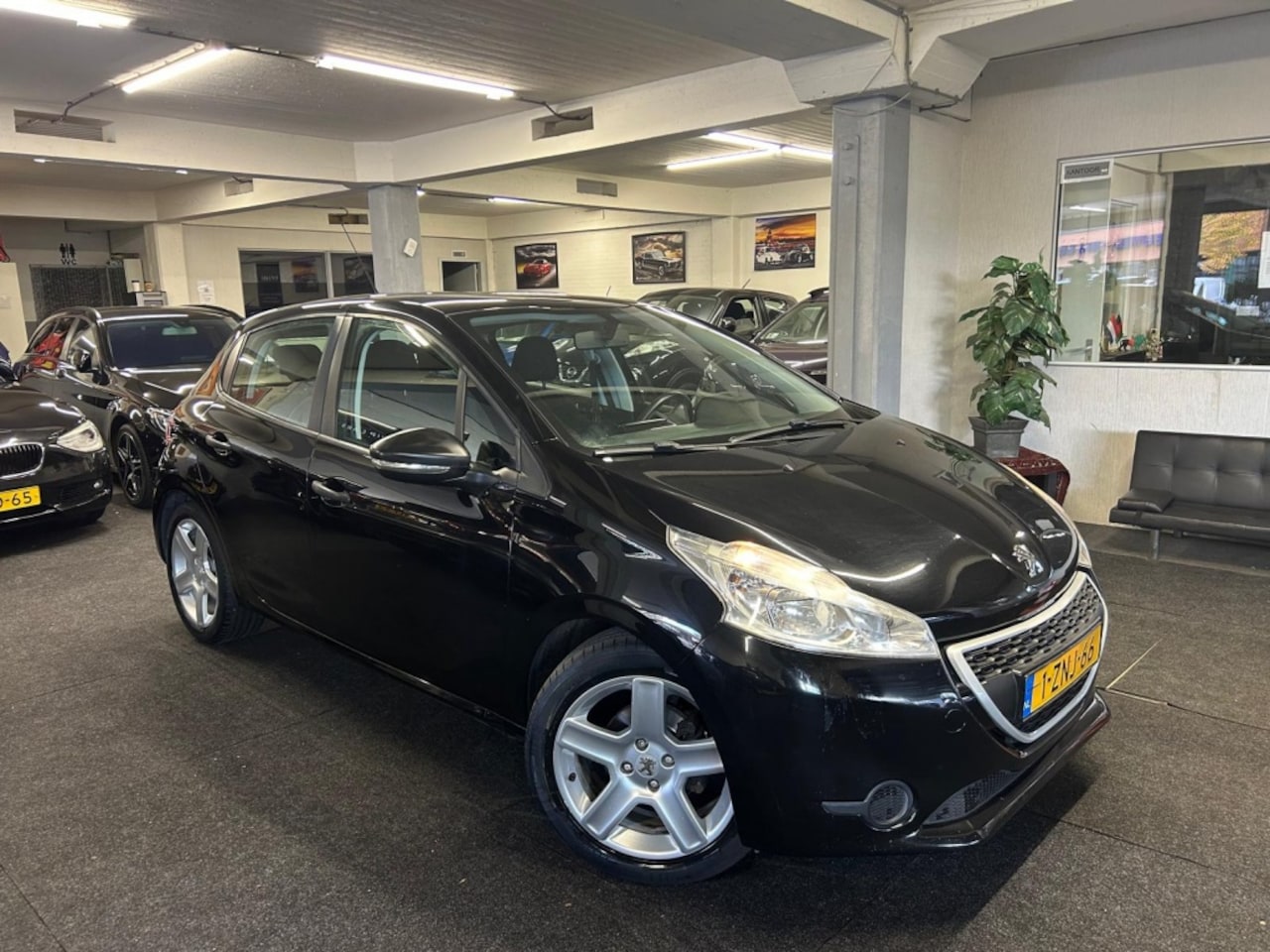Peugeot 208 - 1.0 VTi Access*5deurs*Airco*Velgen - AutoWereld.nl