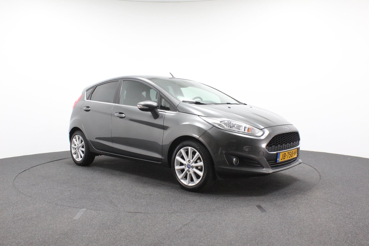 Ford Fiesta - 1.0 EcoBoost Titanium | Climate controle | Navi | Sportvelgen | Parkeersensoren - AutoWereld.nl
