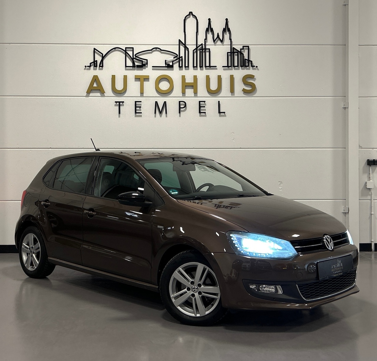 Volkswagen Polo - 1.2 TSI Highline Match Airco Led Cruise Climate Navi Parkeersensoren Stoelverwarming Isofi - AutoWereld.nl