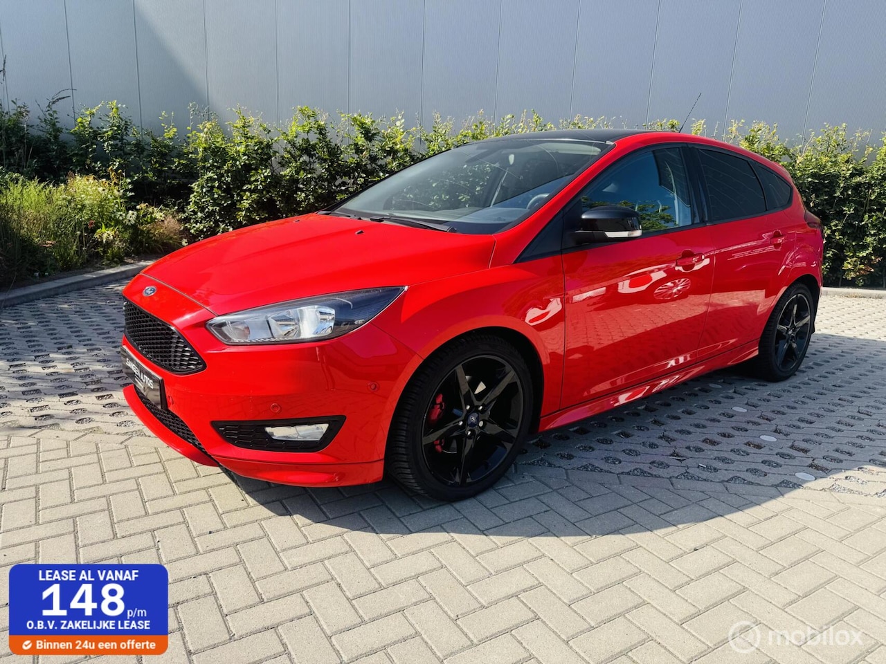 Ford Focus - 1.5 Red Edition ST line Cruise 18 inch PDC Navi - AutoWereld.nl