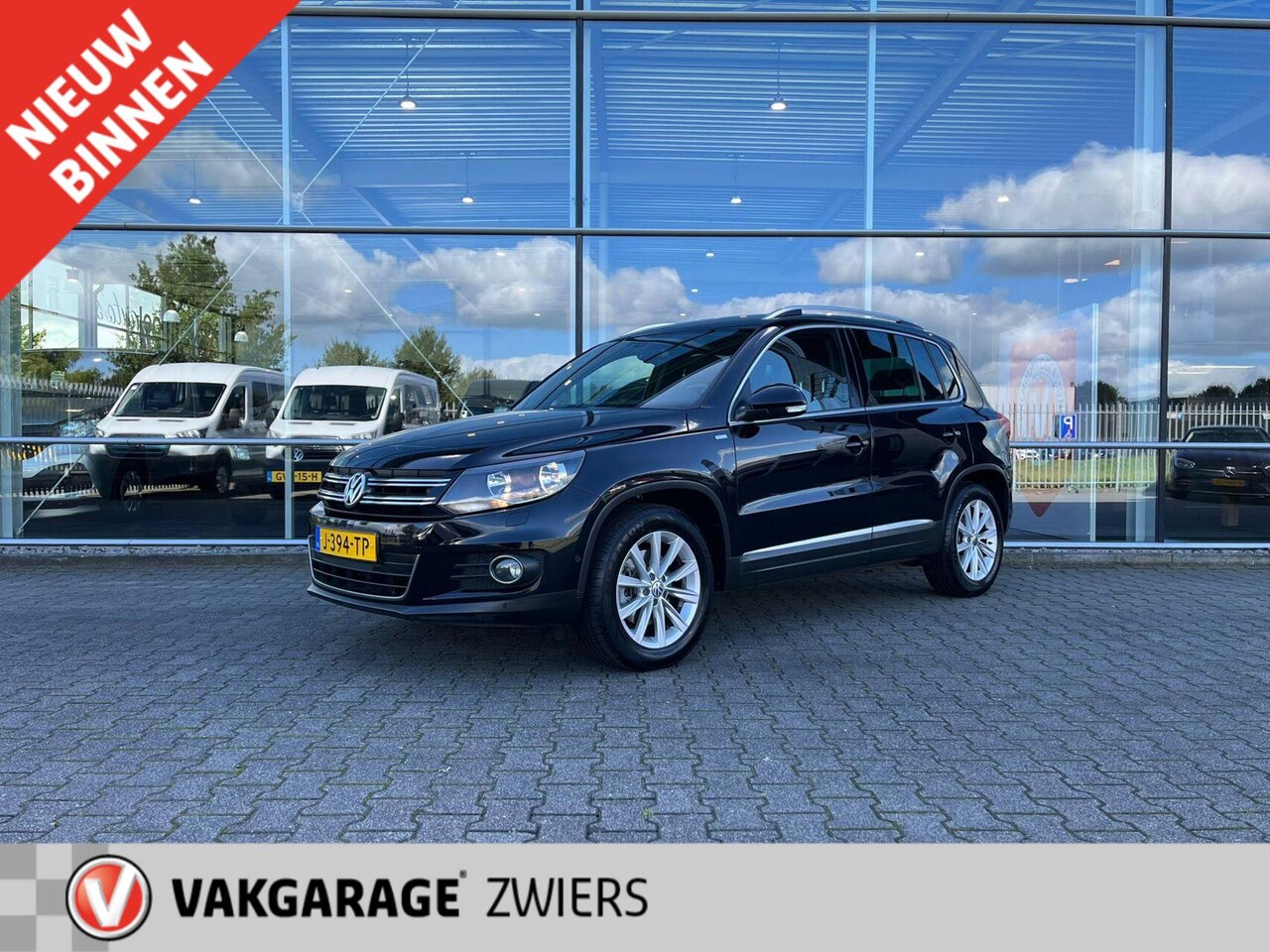 Volkswagen Tiguan - 1.4 TSI Sport&Style Trekhaak PDC - AutoWereld.nl