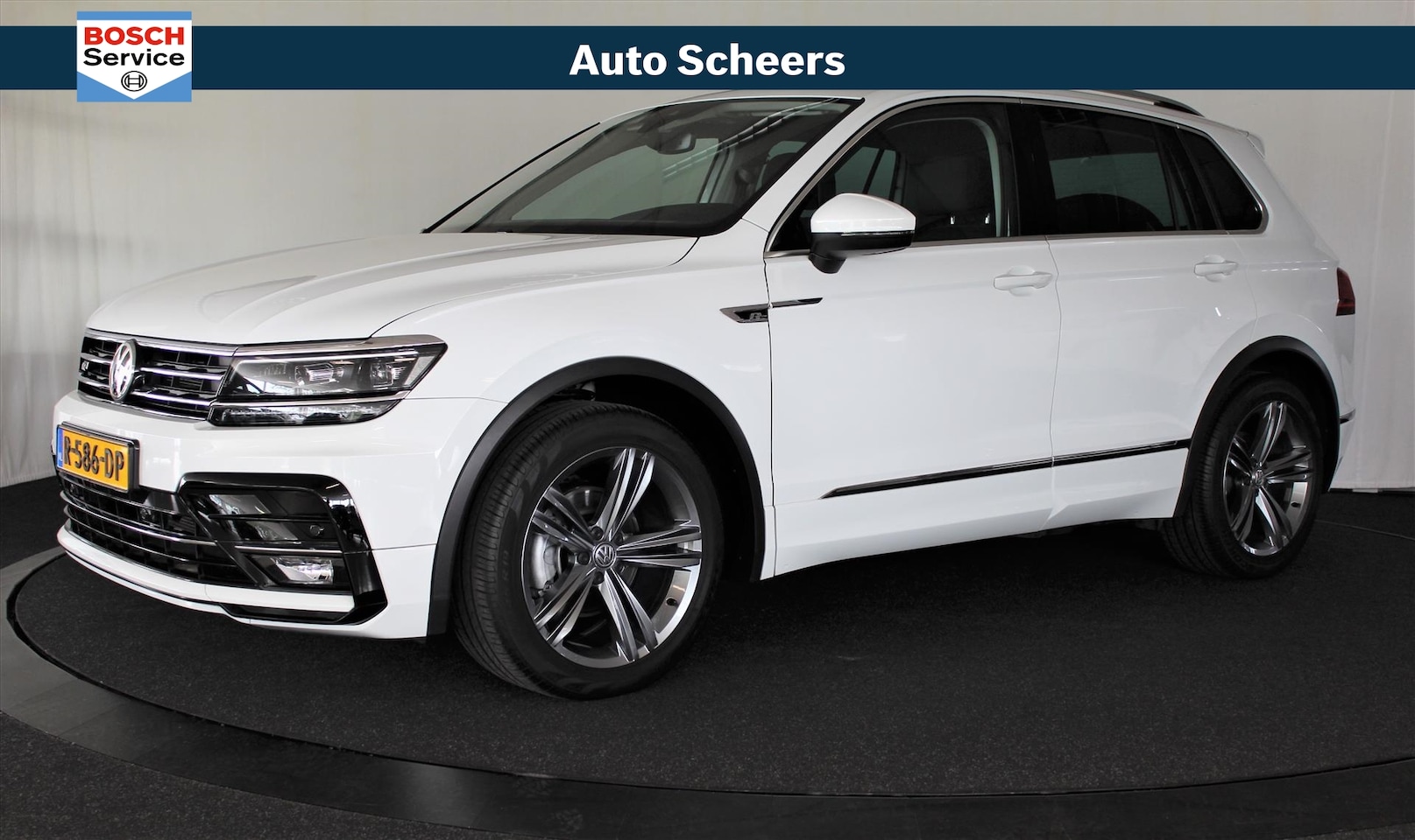 Volkswagen Tiguan - 1.4 TSI 125pk Highline R-Line | Trekhaak | Standkachel - AutoWereld.nl
