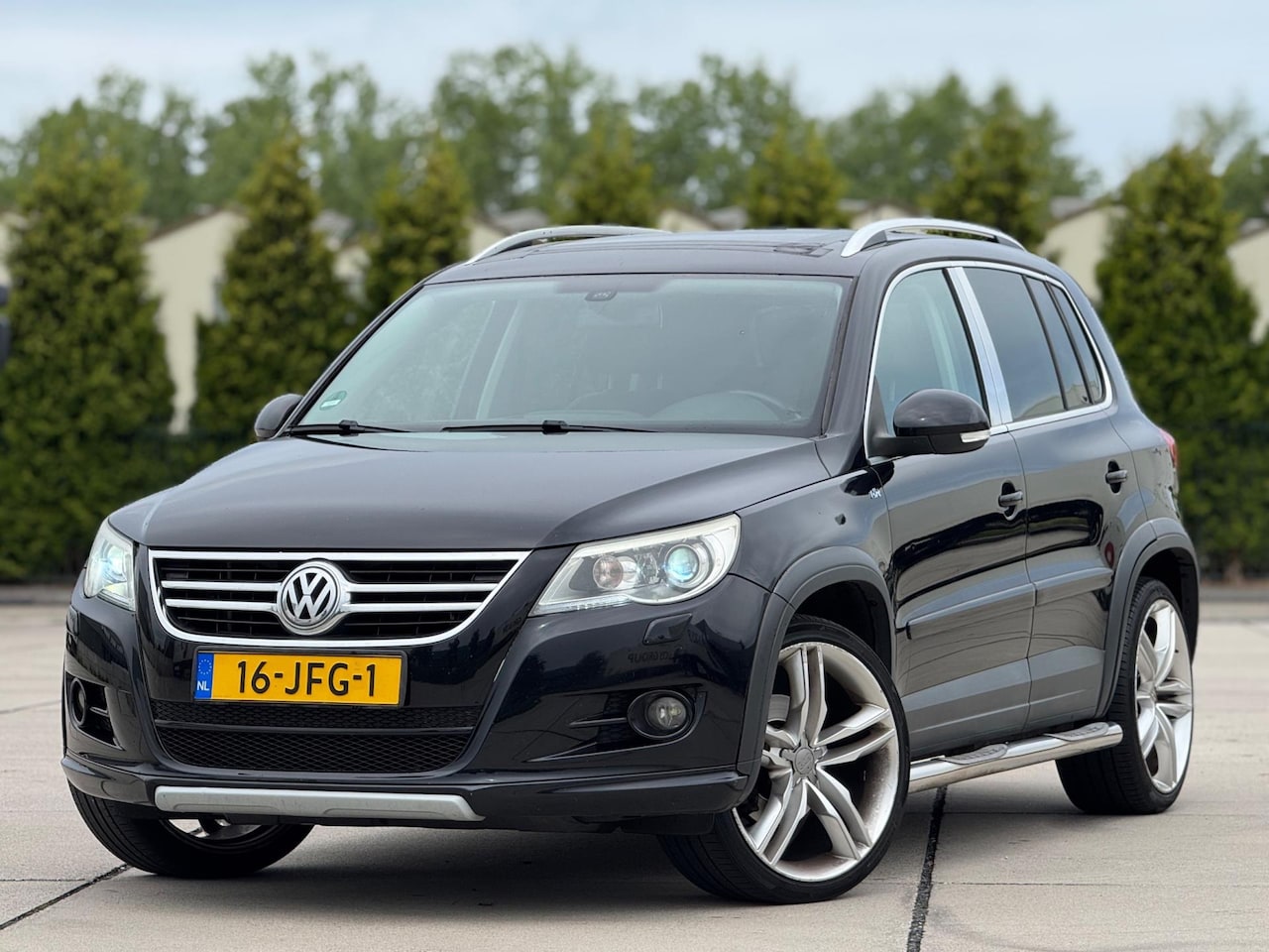 Volkswagen Tiguan - 1.4 TSI Sport&Style 4Motion | Panoramadak | Elektrische sportstoelen met leder | Achteruit - AutoWereld.nl