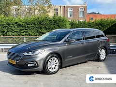 Ford Mondeo Wagon - 2.0 IVCT HEV Titanium | Camera achter | Elektrische verstelbare stoelen | PDC V+A | Naviga