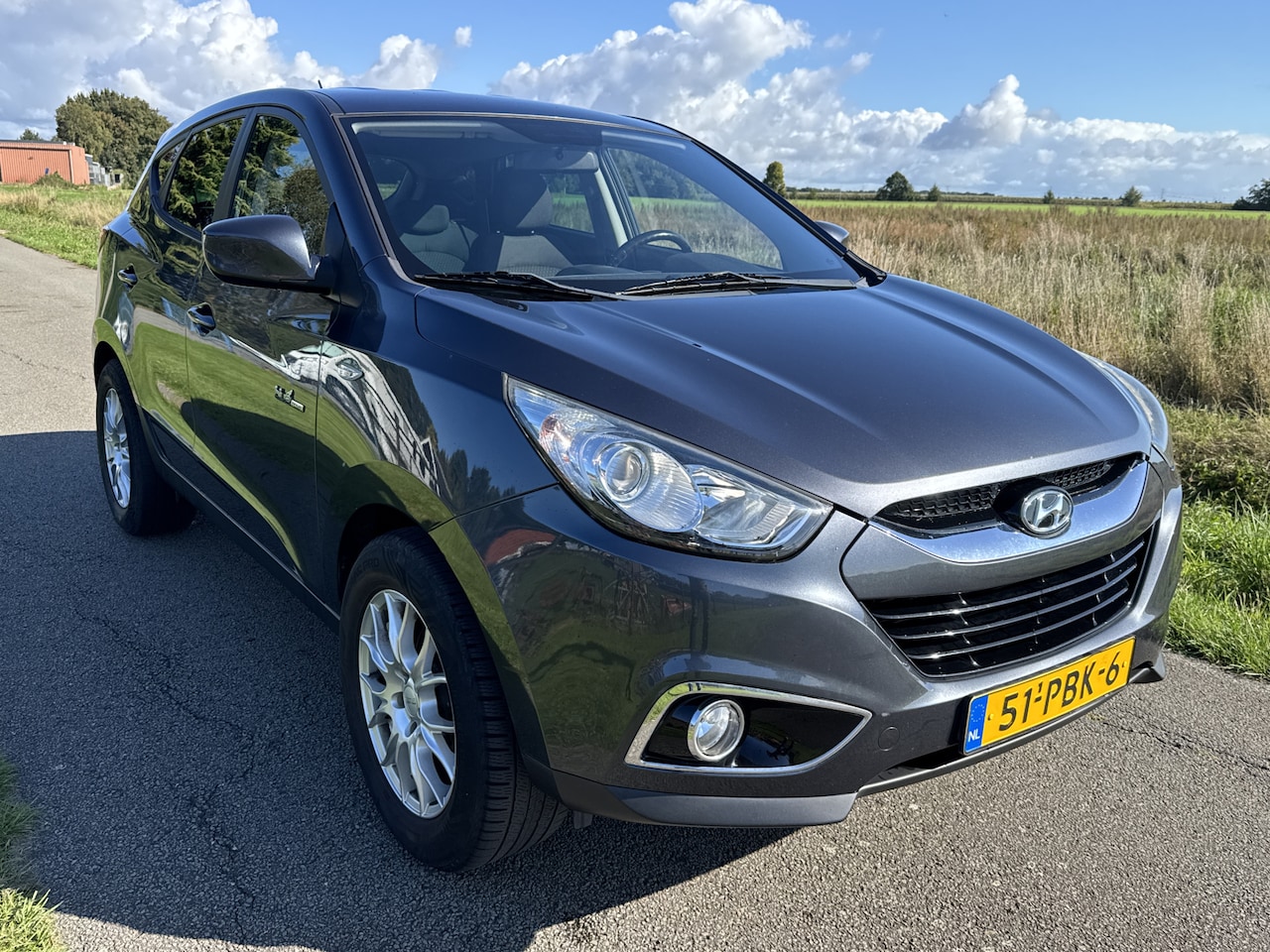 Hyundai ix35 - 1.6i GDI Dynamic NAVI/PDC/CRUISE/BLUETOOTH - AutoWereld.nl