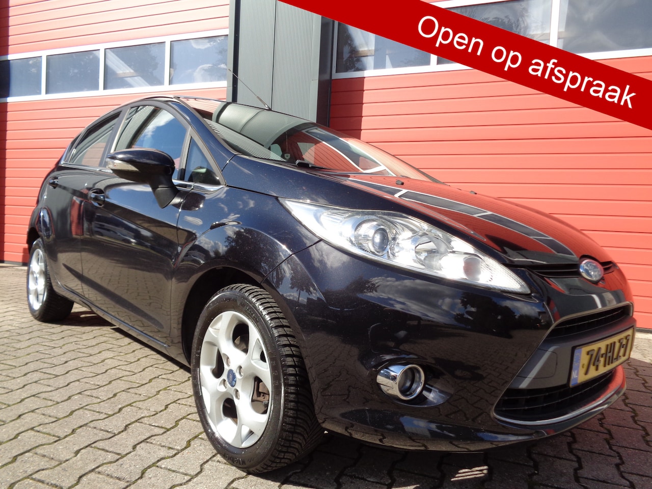 Ford Fiesta - 1.25 Titanium 1.25 Titanium,5drs,Airco,Trekhaak! - AutoWereld.nl
