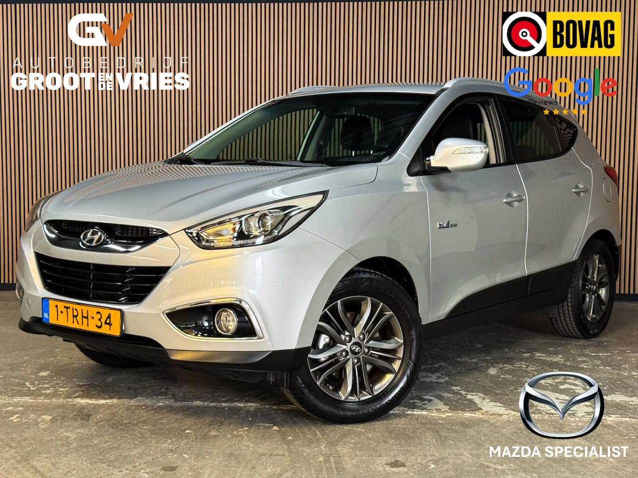 Hyundai ix35 - 1.6i GDI Business Edition Facelift|Camera|Orig NL|Half leer - AutoWereld.nl