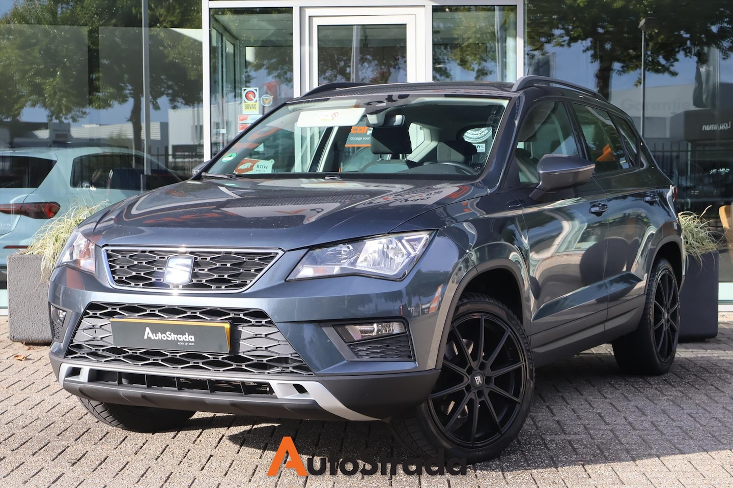 SEAT Ateca - 1.4 Style EcoTSI 150pk | Sensoren | Cruise | Climate | Carplay | Trekhaak - AutoWereld.nl