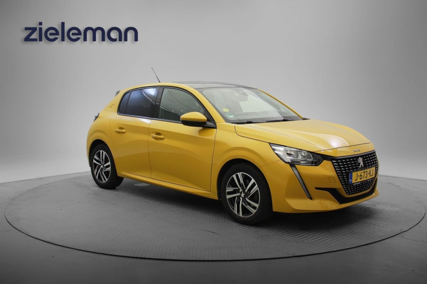 Peugeot 208 - 1.5 BlueHDi Allure - Carplay, Panorama, Camera, Half Leer - AutoWereld.nl