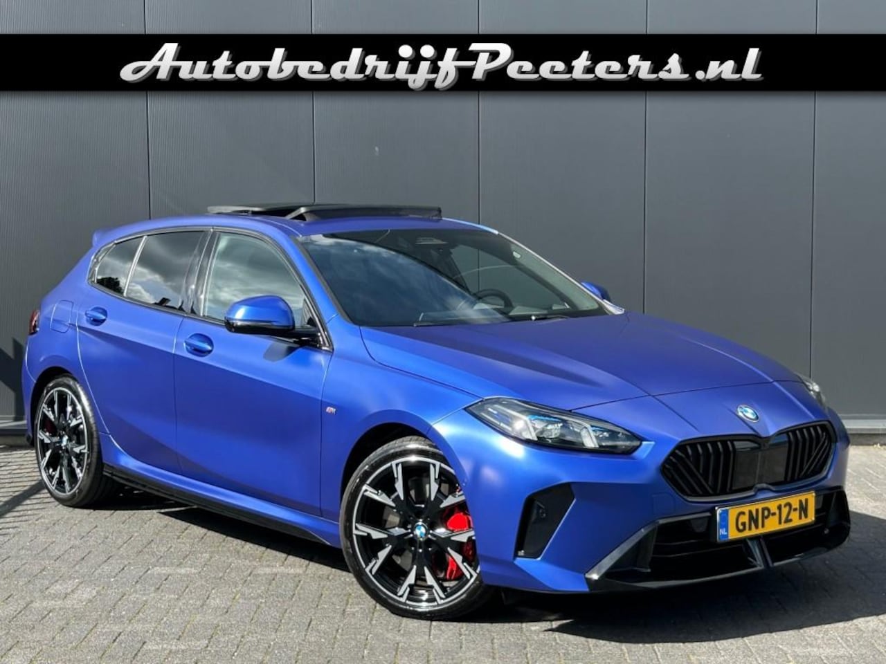 BMW 1-serie - 120 M Sport Pro P-dak LED H/K HUD ACC Live Cockpit Frozen Blue NL-auto - AutoWereld.nl