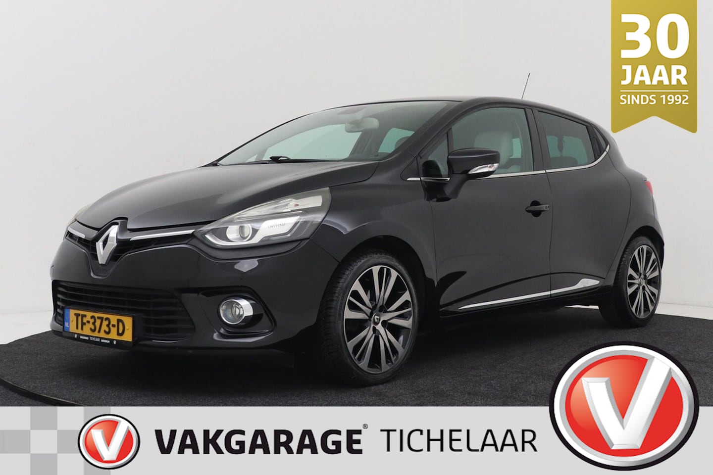 Renault Clio - 1.2 Initiale Paris | Leer | Climate Control | Xenon | Stoelverwarming | Camera | - AutoWereld.nl
