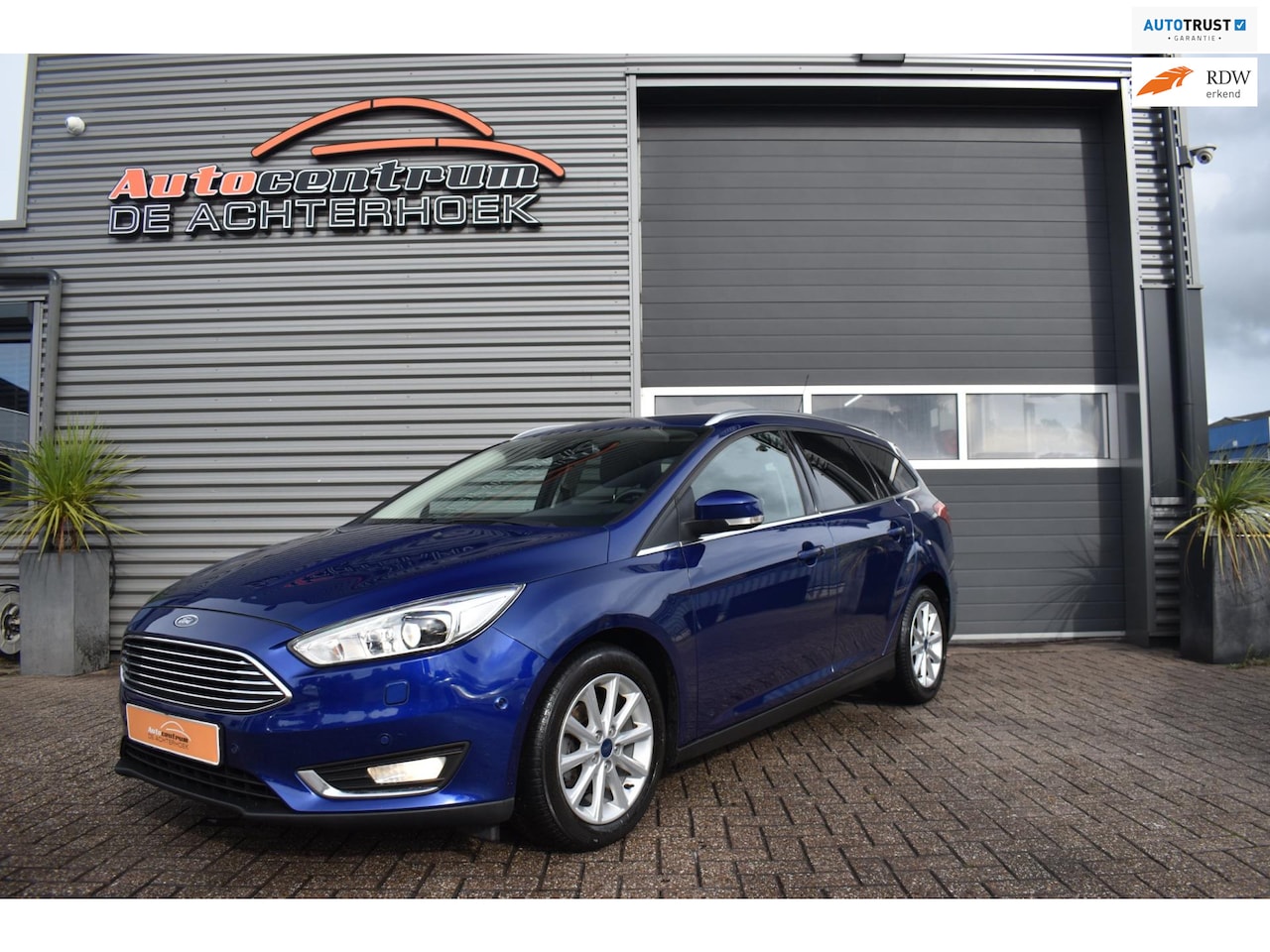 Ford Focus Wagon - 1.0 Titanium Xenon / Camera / Cruise control / Stoelverwarming!! - AutoWereld.nl