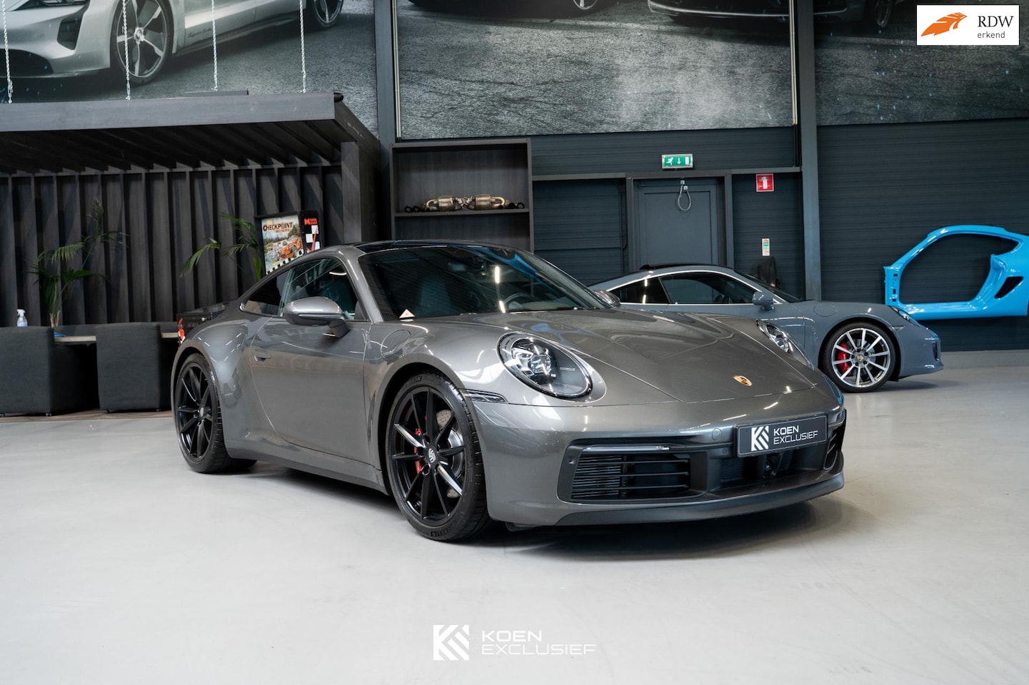 Porsche 911 - 992 3.0 Carrera 4 S Km (2019) achteras-sturing, sportuitlaat, Sport Chrono - AutoWereld.nl