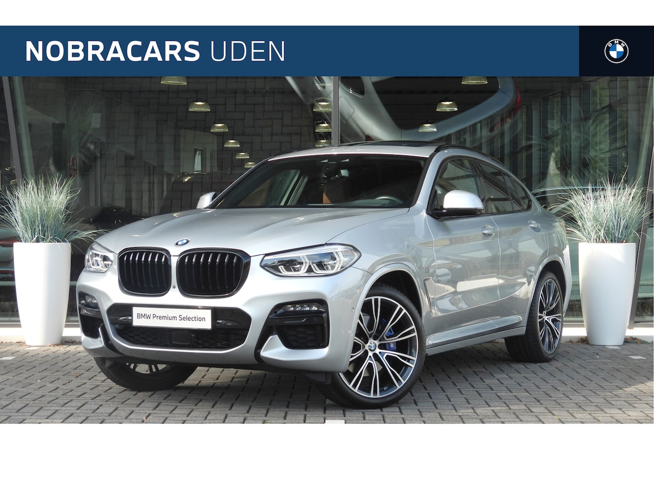BMW X4 - M40i Automaat / Panoramadak / Trekhaak / Sportstoelen / M Adaptief onderstel / Adaptieve L - AutoWereld.nl