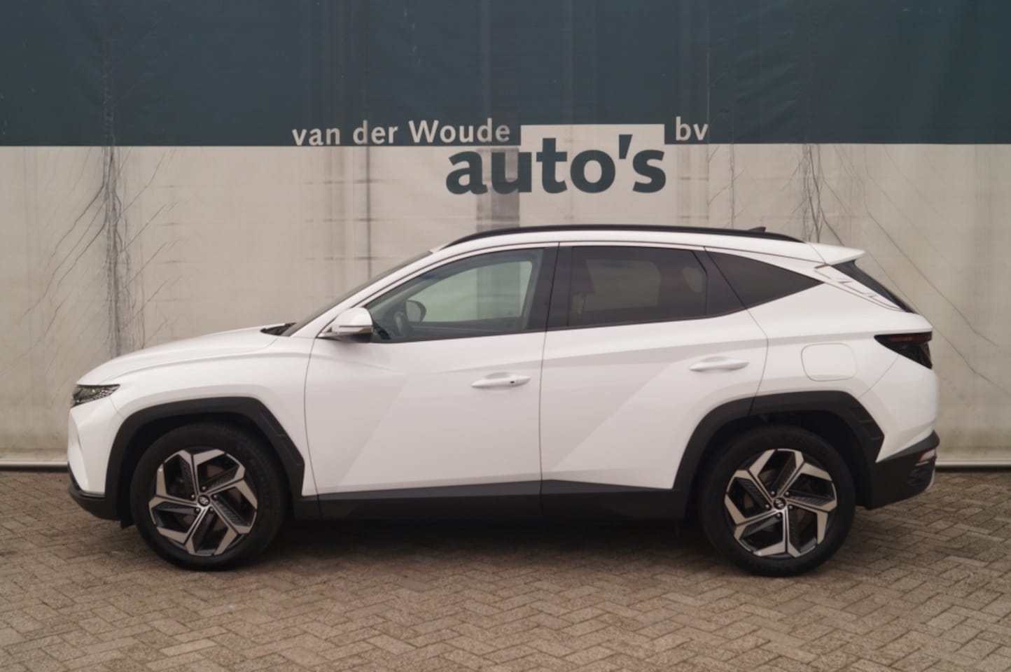 Hyundai Tucson - 1.6 T-GDI 180pk PHEV Automaat Comfort -NAVI-ECC- - AutoWereld.nl