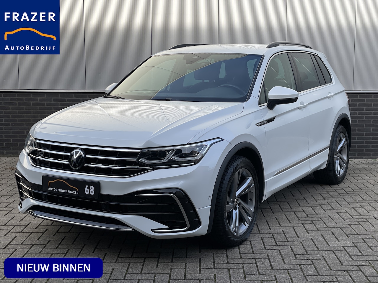 Volkswagen Tiguan - 1.5 TSI R-Line AUTOMAAT / LED / NAVI / ELECT. KLEP / RIJKLAAR - AutoWereld.nl