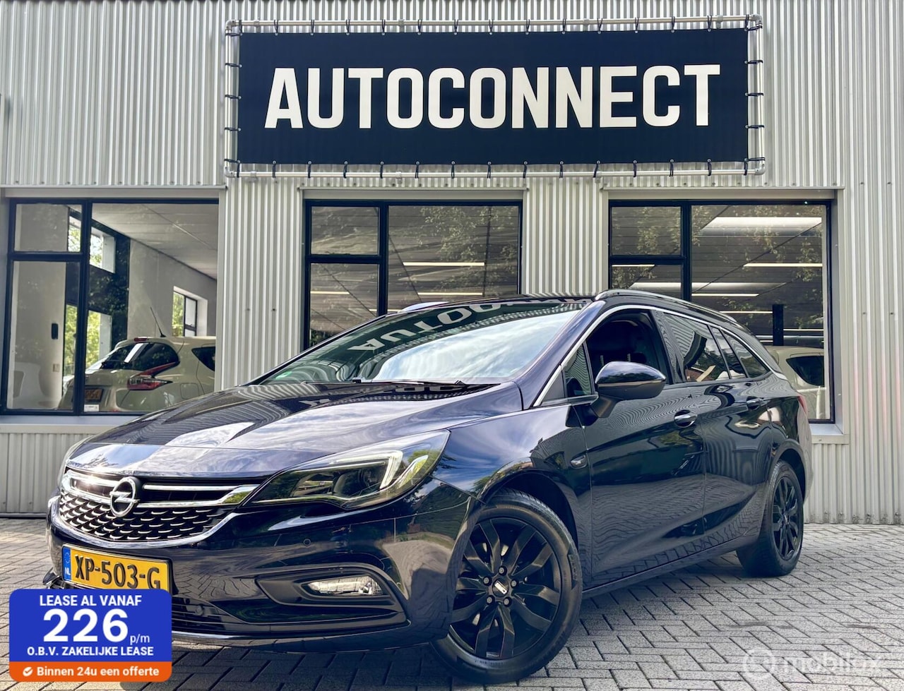Opel Astra Sports Tourer - 1.4 Innovation. LEDER, NAVI, CRUISE, STOELVERWARMING - AutoWereld.nl