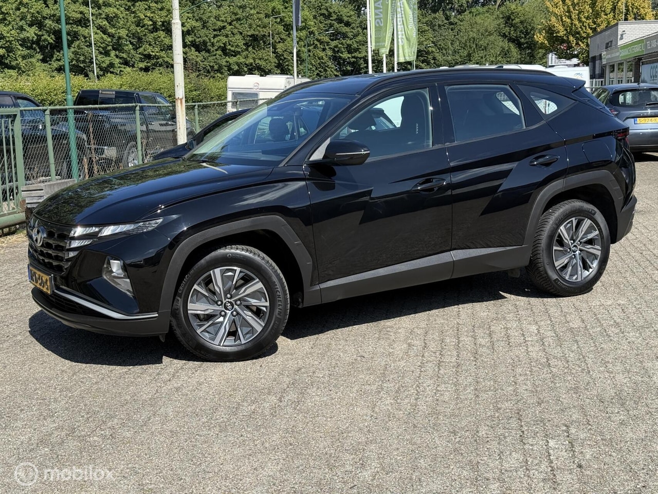 Hyundai Tucson - 1.6 T-GDI HEV Comfort hybride bj22 - AutoWereld.nl