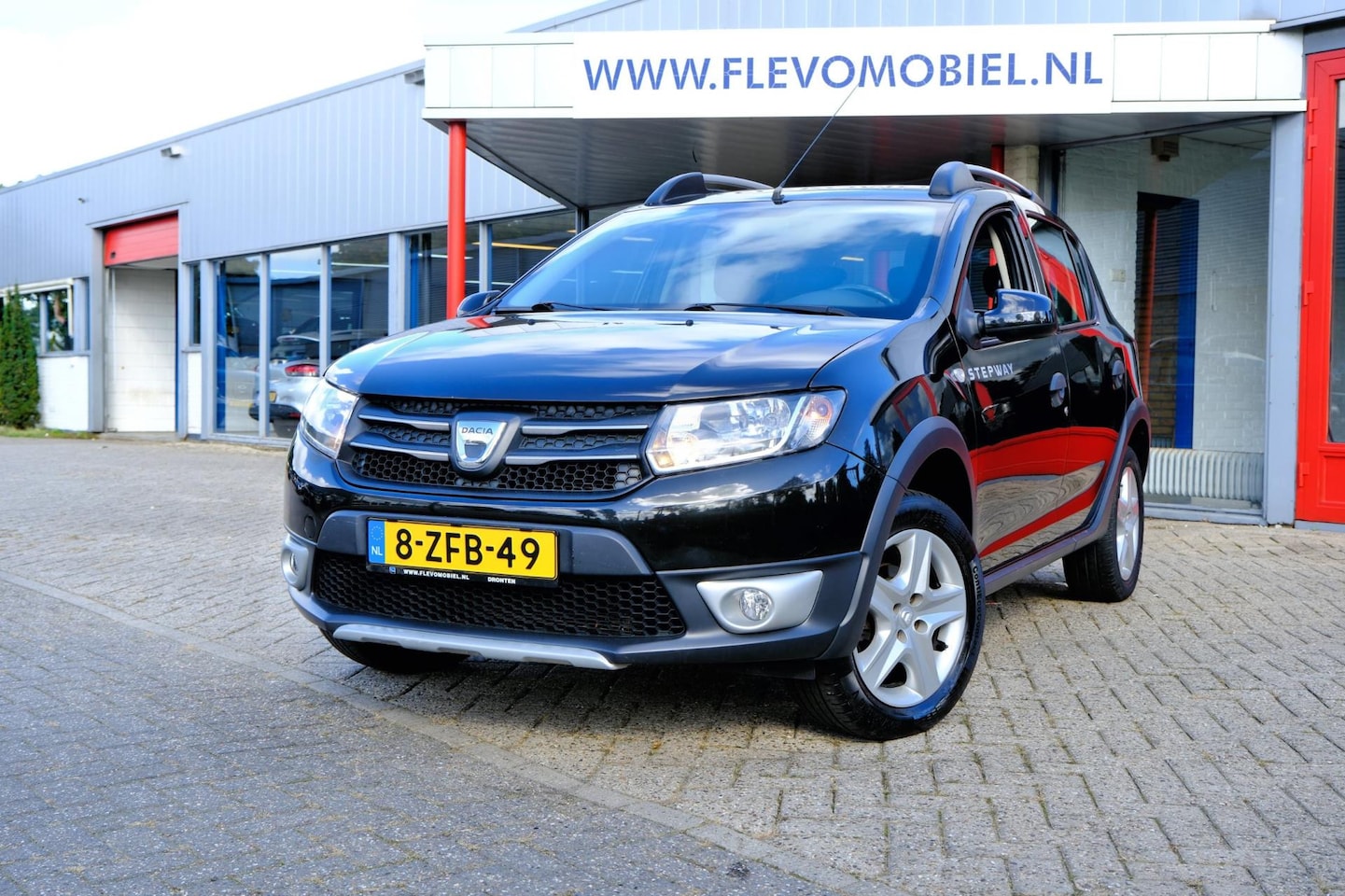 Dacia Sandero Stepway - 0.9 TCe Lauréate Navi|1e Eig!|Airco|Cruise|Trekhaak - AutoWereld.nl