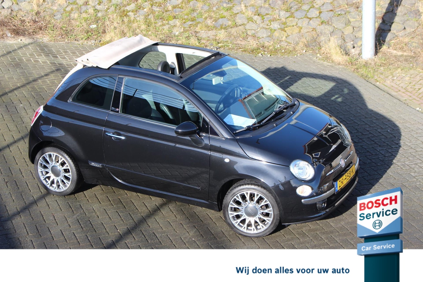 Fiat 500 C - 1.2 Rock Cabrio Leder Navi Parkdistance blue tooth airco 16 inch lm velgen - AutoWereld.nl