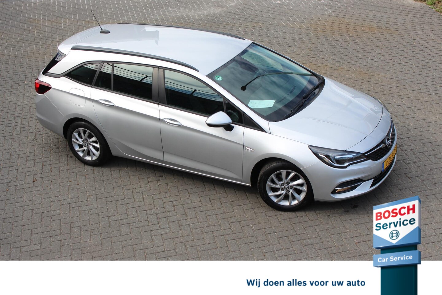 Opel Astra Sports Tourer - 1.2 Edition 1.2 Edition 131PK , AGR stoel,carplay android, Navi, Camera, climate + cruise control,1e e - AutoWereld.nl