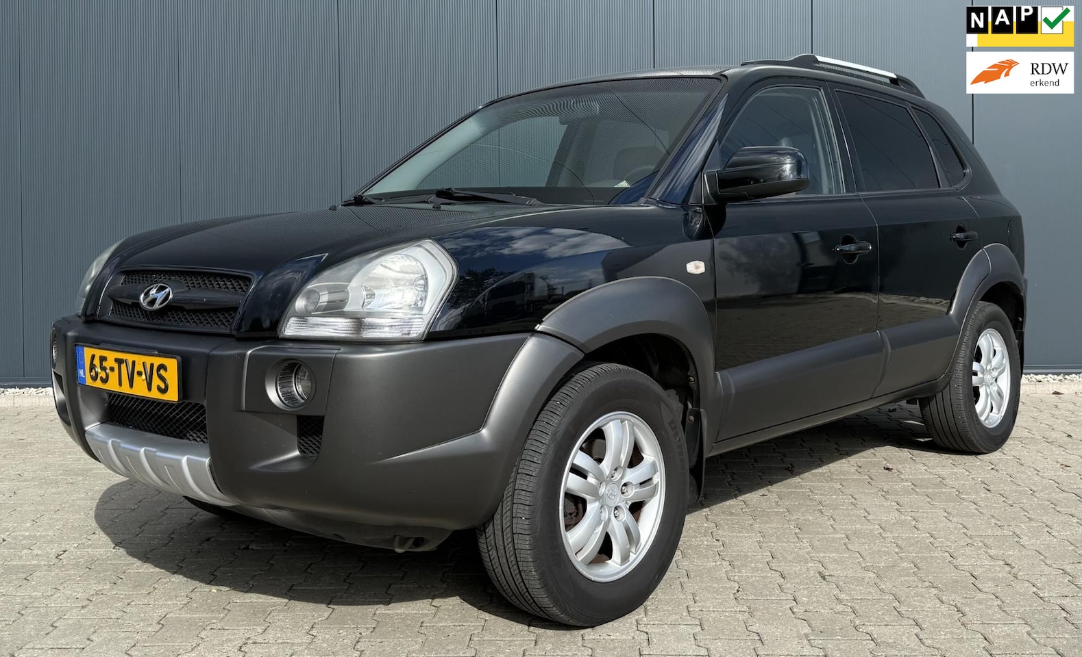 Hyundai Tucson - 2.0i Style Premium Airco Cruise Trekhaak leder APK - AutoWereld.nl