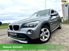 BMW X1 - SDrive18i Executive NAP/ Airco/ Navi Scherm/ Trekhaak/ Velgen