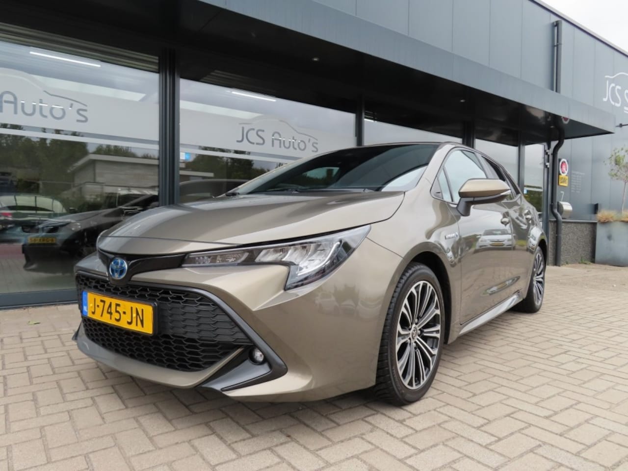 Toyota Corolla - 1.8 Hybrid Bns Plus Ecc Led Navi Trekhaak 2020 - AutoWereld.nl