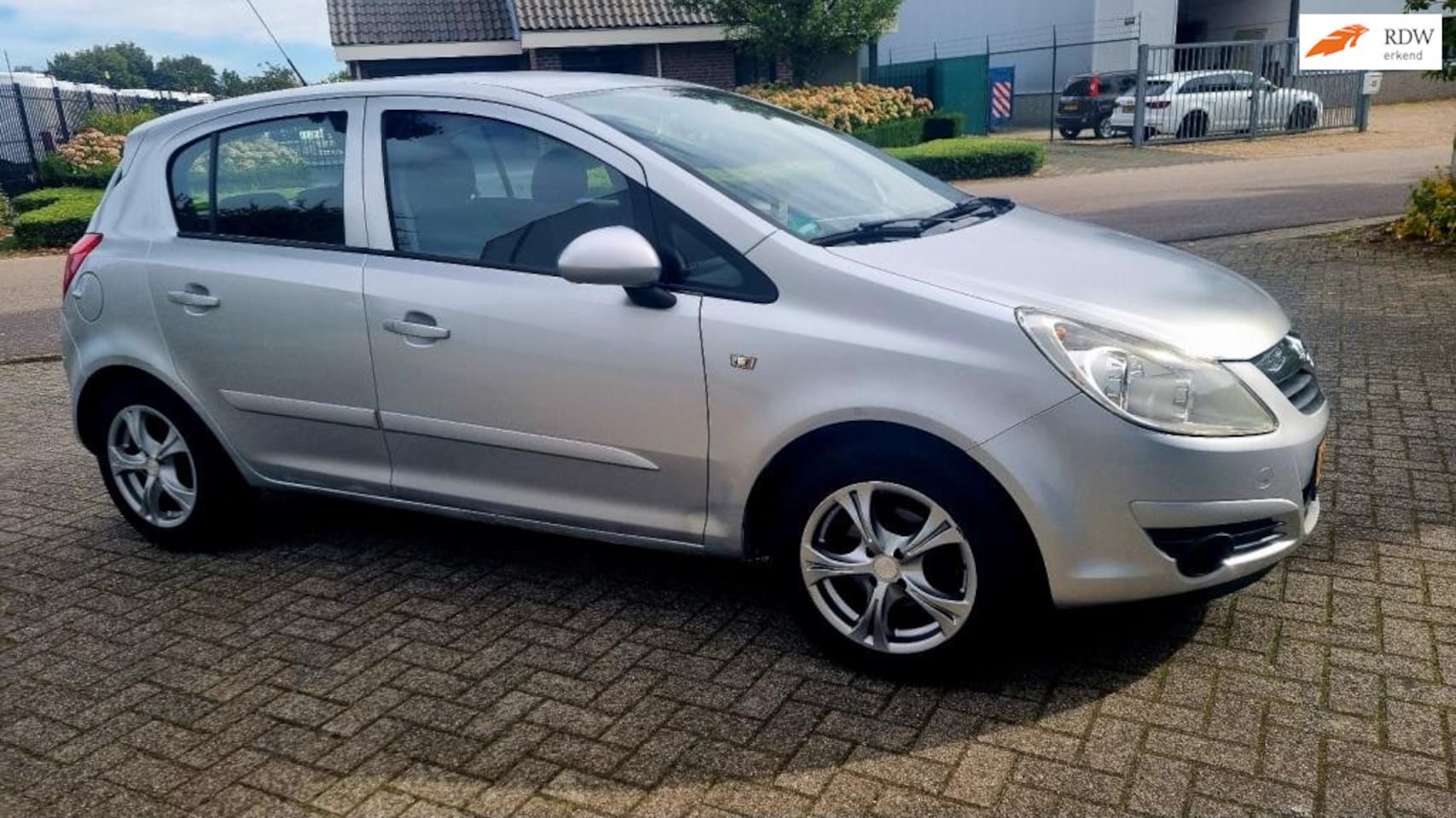Opel Corsa - 1.2-16V Enjoy 1.2-16V Enjoy - AutoWereld.nl