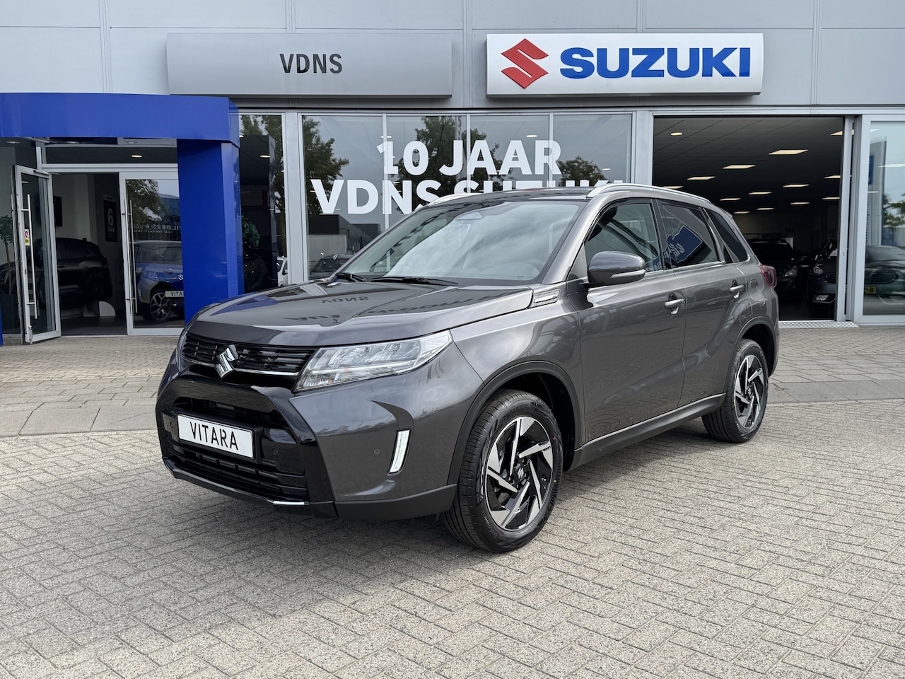 Suzuki Vitara - 1.4 Boosterjet Style Hybrid Automaat Direct uit voorraad leverbaar. info: M.safari 0492588 - AutoWereld.nl
