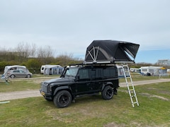 Land Rover Defender - 2.4 TD 110 SW E Prachtige zwarte Defender met snorkel, roofrack (flatdog) en complete Yuna daktent