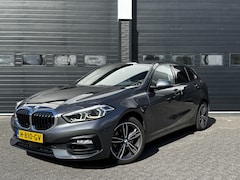 BMW 1-serie - 118i High Executive Automaat | A/C Climate | App. Carplay | Cruise | €18.499, - incl. BTW