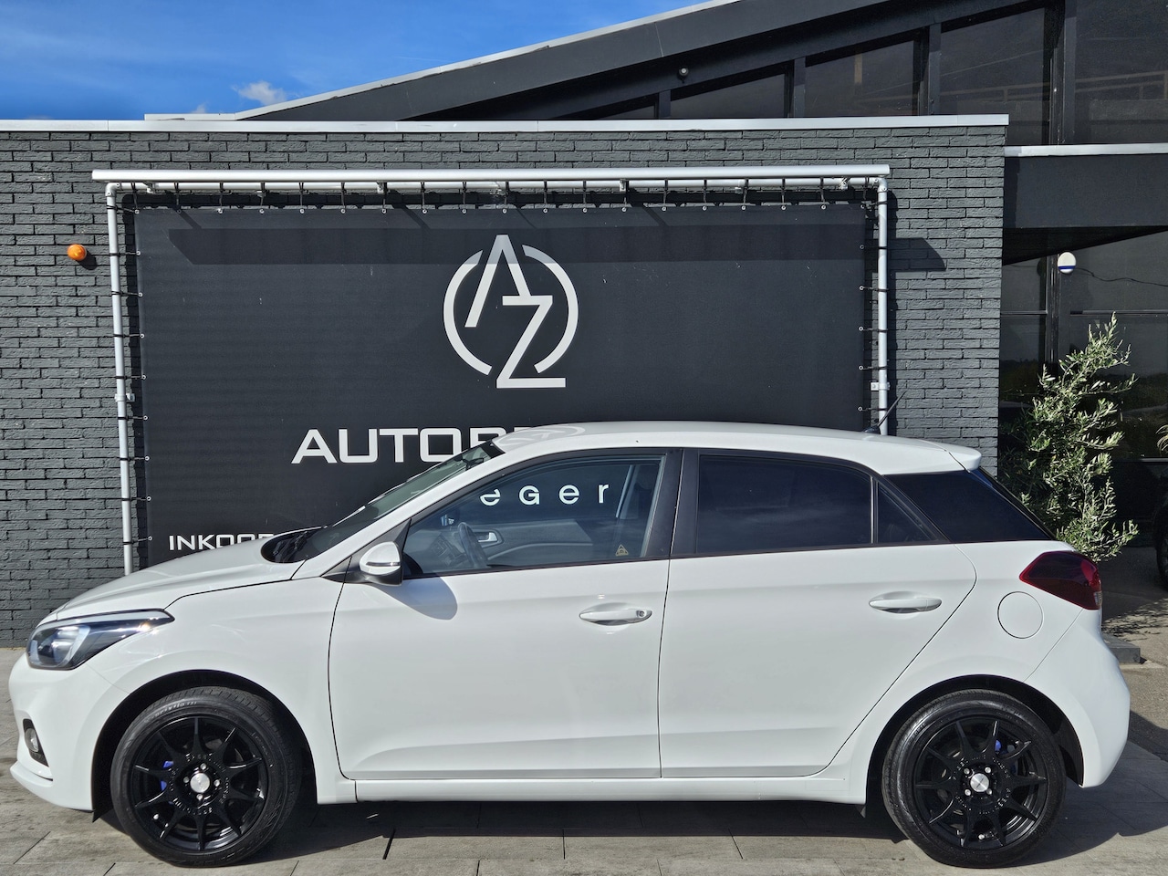Hyundai i20 - 1.2 HP i-Motion Premium *AC*Navi**Speedline pakket - AutoWereld.nl