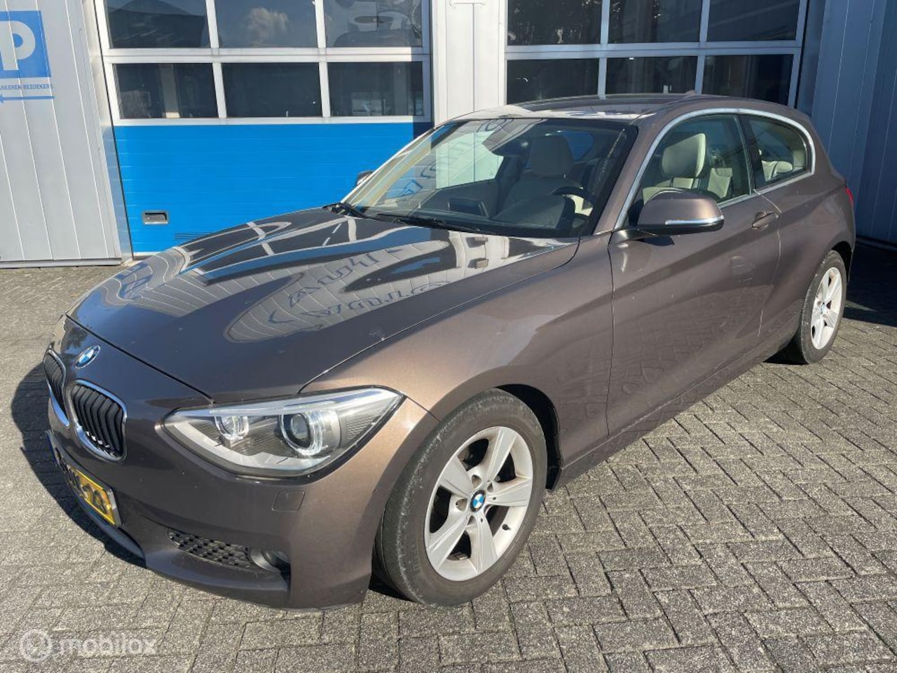 BMW 1-serie - 116i EDE High Exe. XENON NAVI BLUET PDC CRUISE - AutoWereld.nl