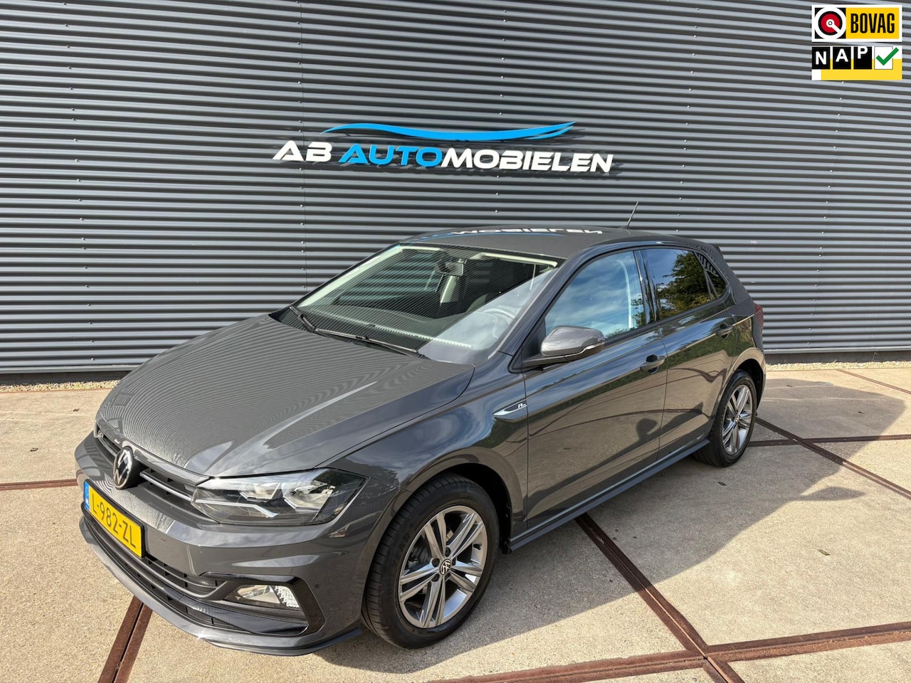 Volkswagen Polo - 1.0 TSI R-Line AUTOMAAT/ NAVI - AutoWereld.nl