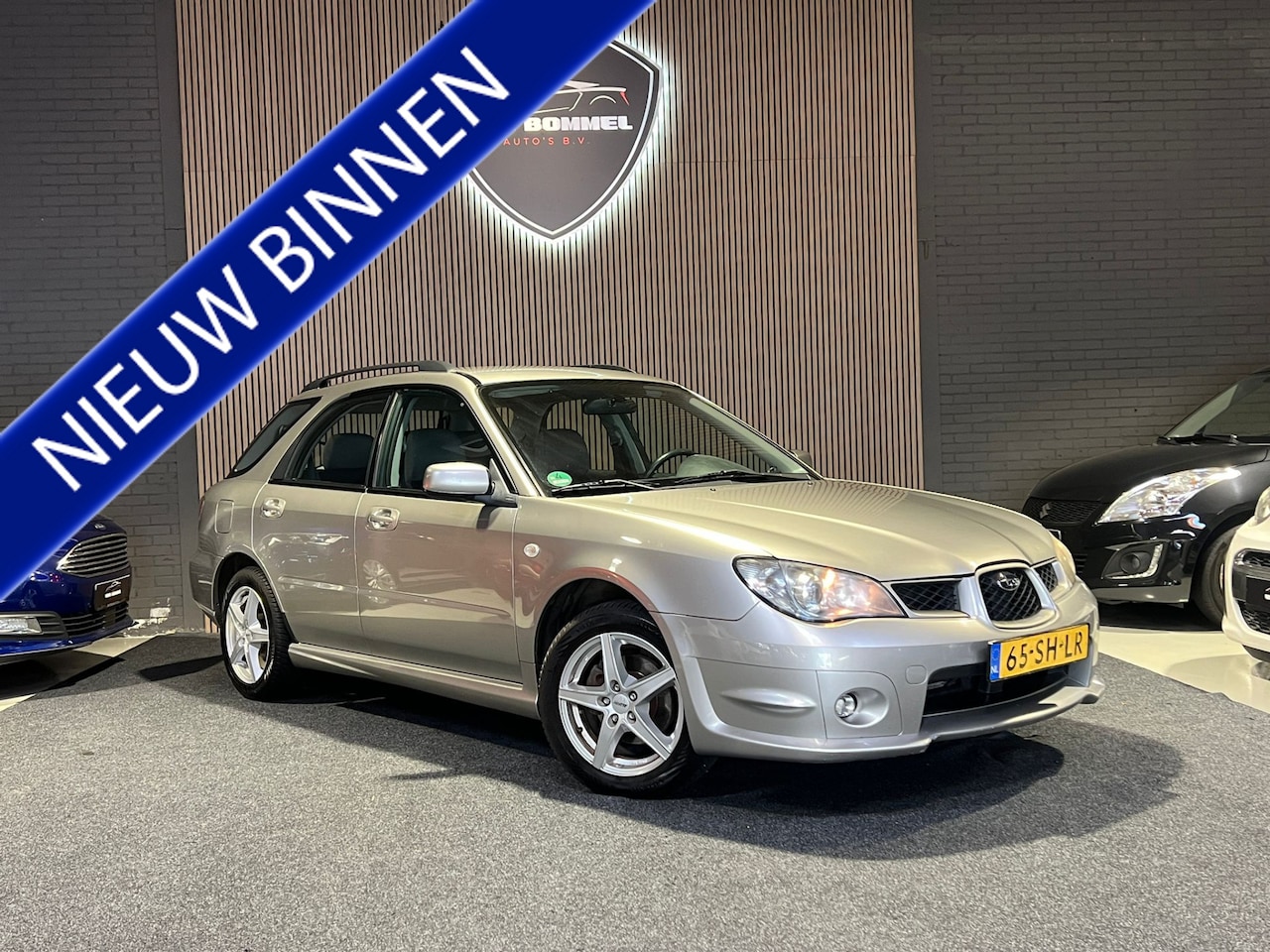 Subaru Impreza Plus - 2.0R Airco.CruiseC.Trekh.Elecpakket.LMV!!! - AutoWereld.nl