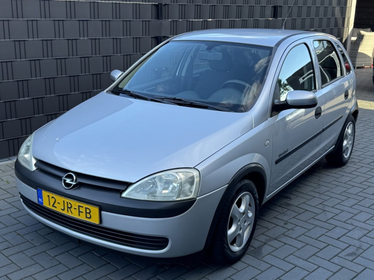 Opel Corsa - 1.2-16V Comfort| GRIJS| 5DRS| ZEER NETJES| NAP| LM - AutoWereld.nl
