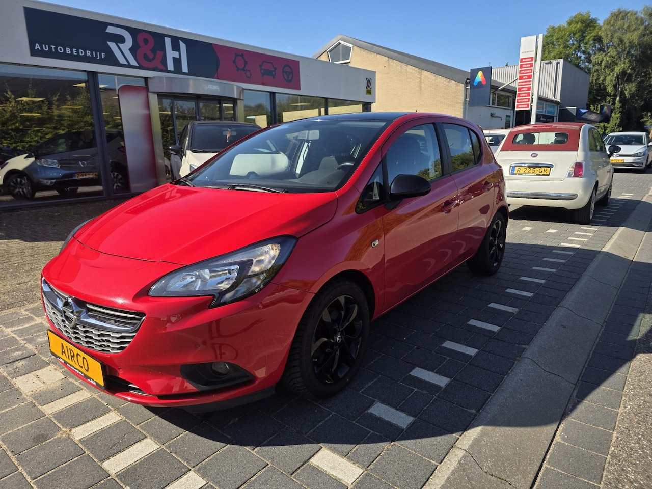 Opel Corsa - 1.4 color edition 5 deurs, airco, sportvelgen, cruise control, stoelverwing, stuur verwarm - AutoWereld.nl