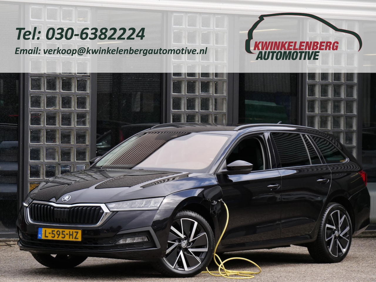 Skoda Octavia Combi - 1.4TSi PHEV BUSINESS ED/ ADAPTIVE CRUISE/ SFEERVERLICHTING/ ELEKT. KLEP/ PDC V+A - AutoWereld.nl