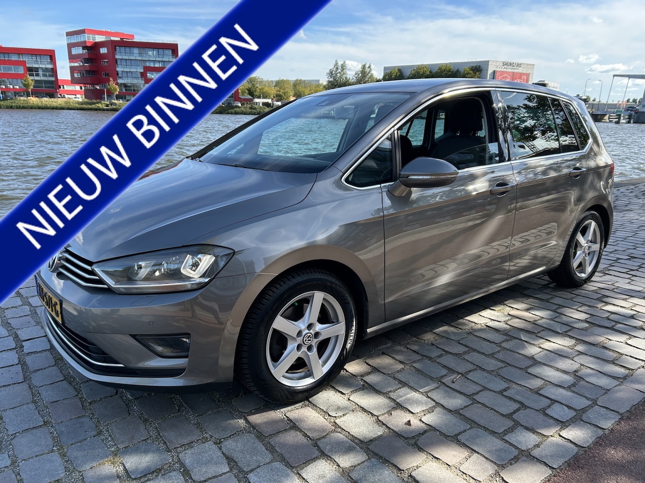 Volkswagen Golf Sportsvan - 1.4 TSI Highline automaat airco/ecc navi alcantara - AutoWereld.nl