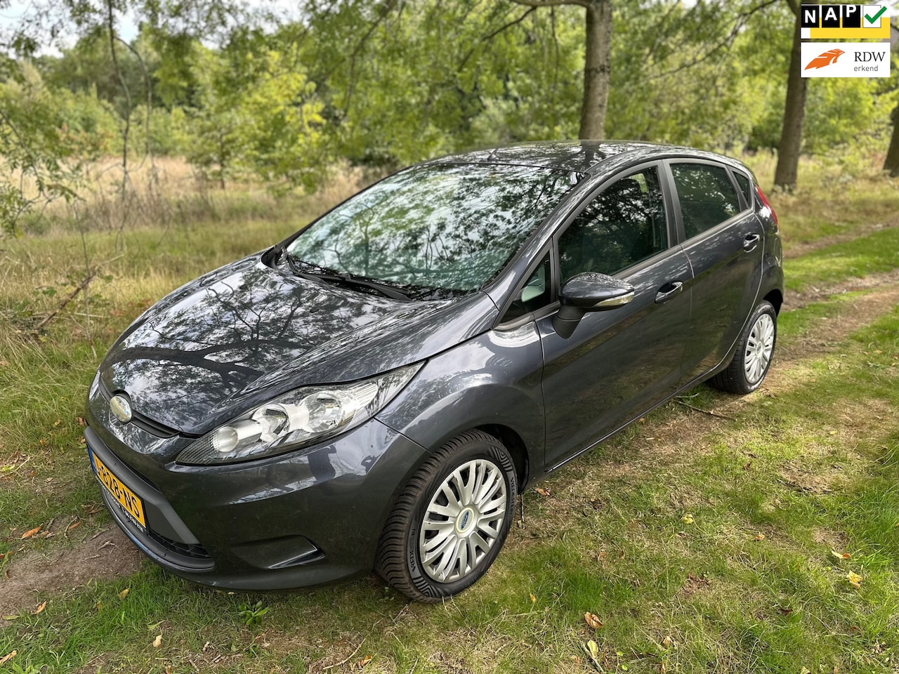 Ford Fiesta - 1.25 Ghia 1.25 Ghia - AutoWereld.nl