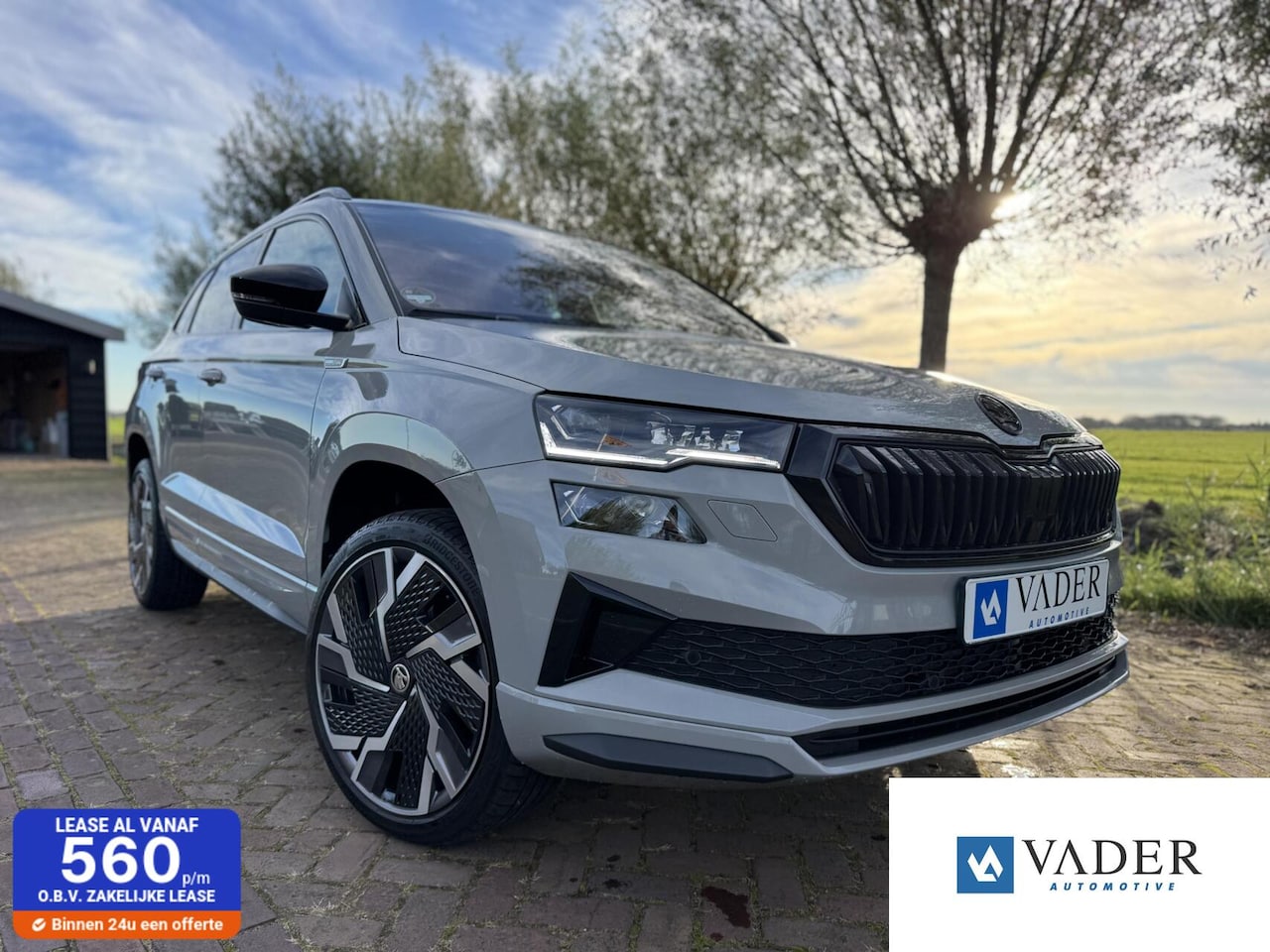 Skoda Karoq - 1.5 TSI ACT DSG Sportline Pano Steel Grey 19'' - AutoWereld.nl